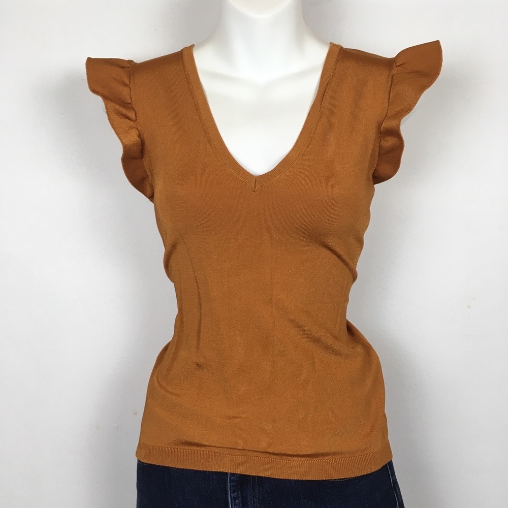 Rustic orange top with shoulder frills